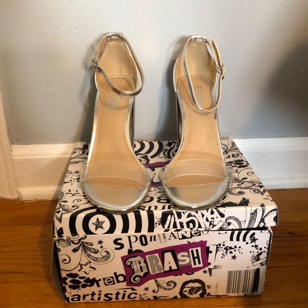 Brand new with box silver clear strap heels!